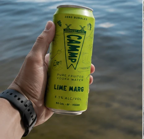 CAMMP Lime Marg can held beside the water