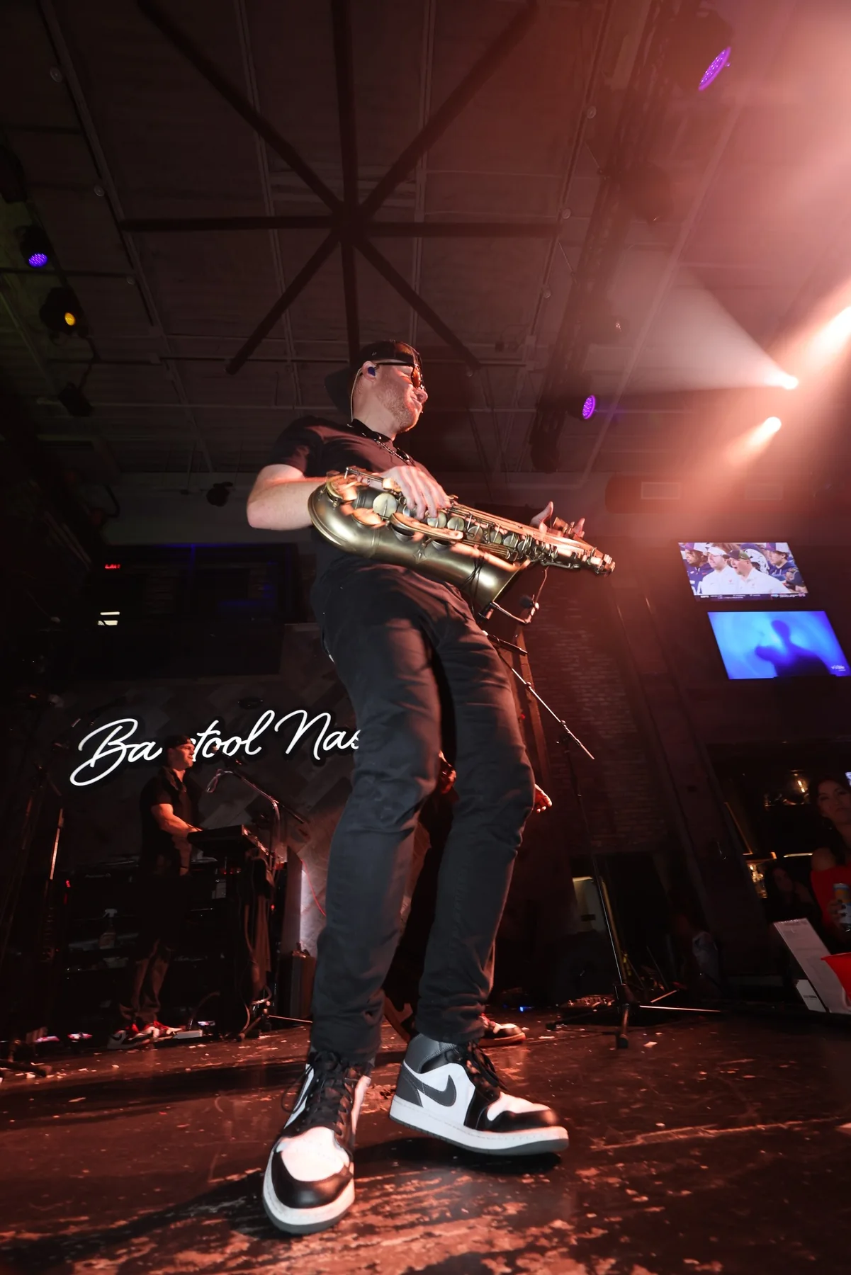 Saxophone player performing at Barstool Nashville