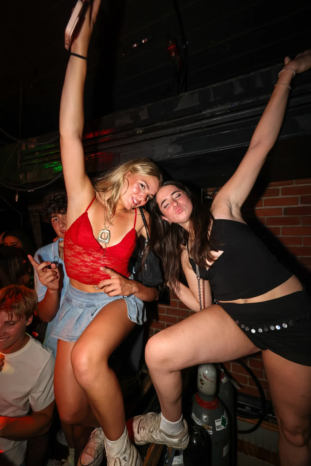Friends dancing together on the dance floor