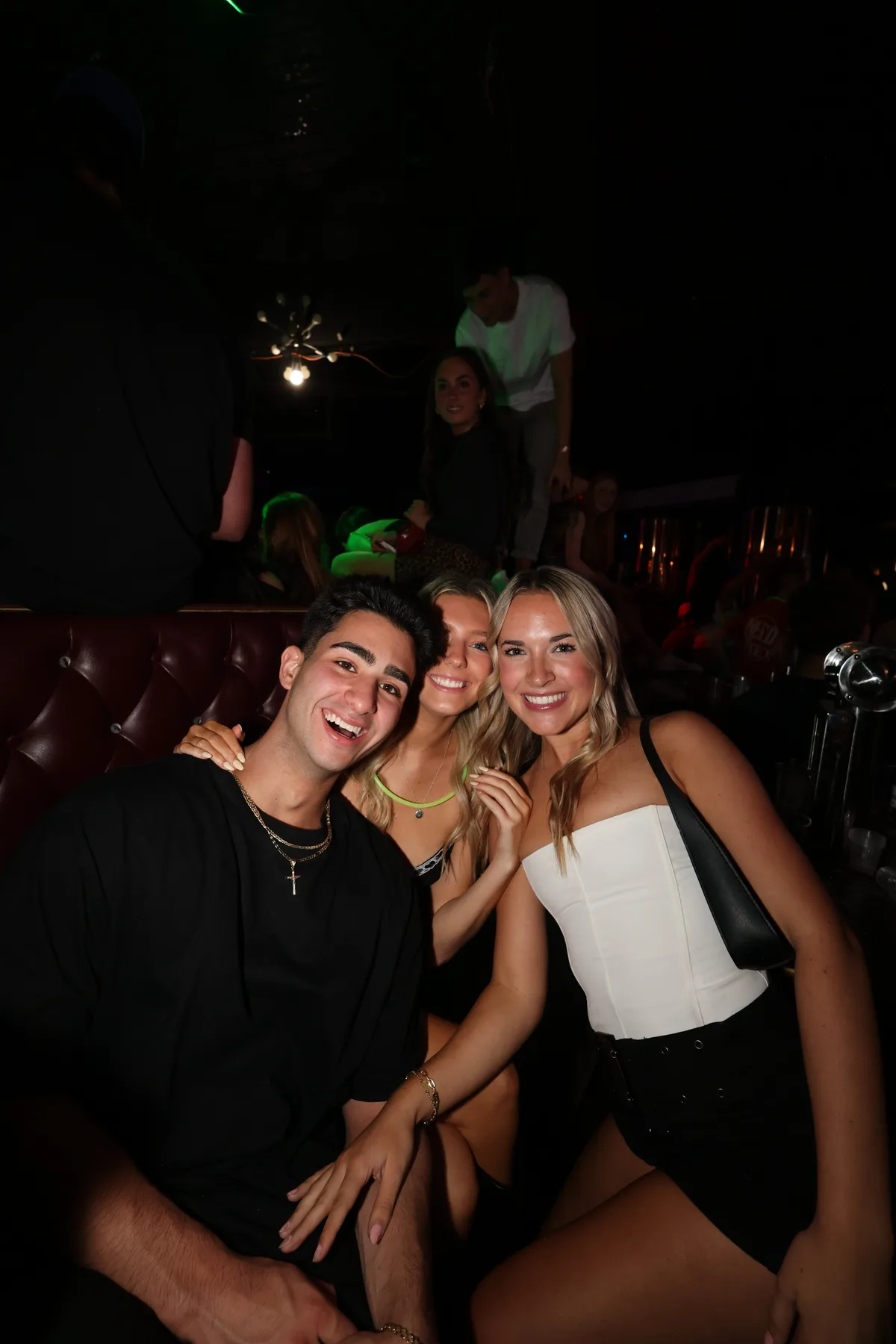 Group photo in a bar booth