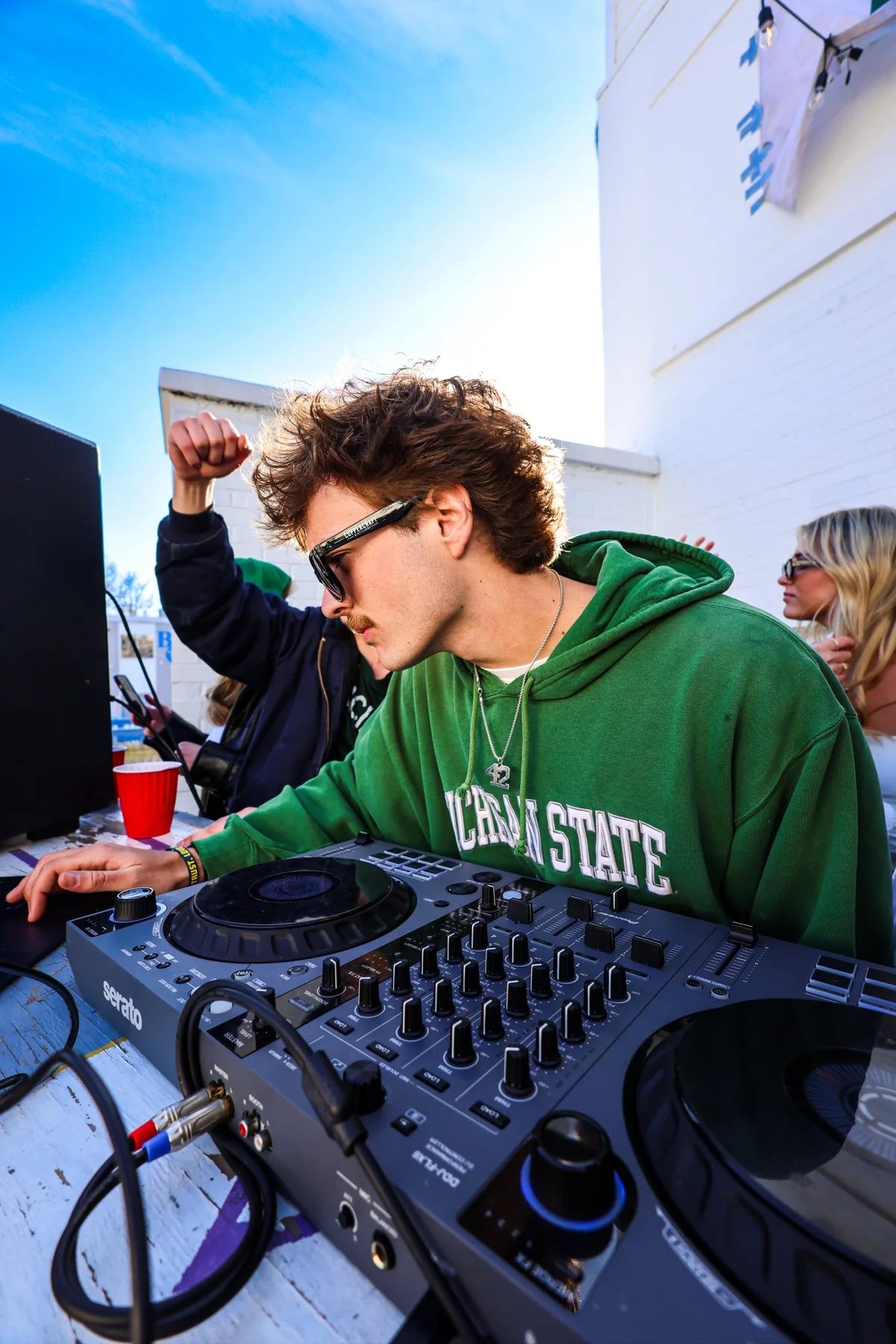 Outdoor campus DJ event photography